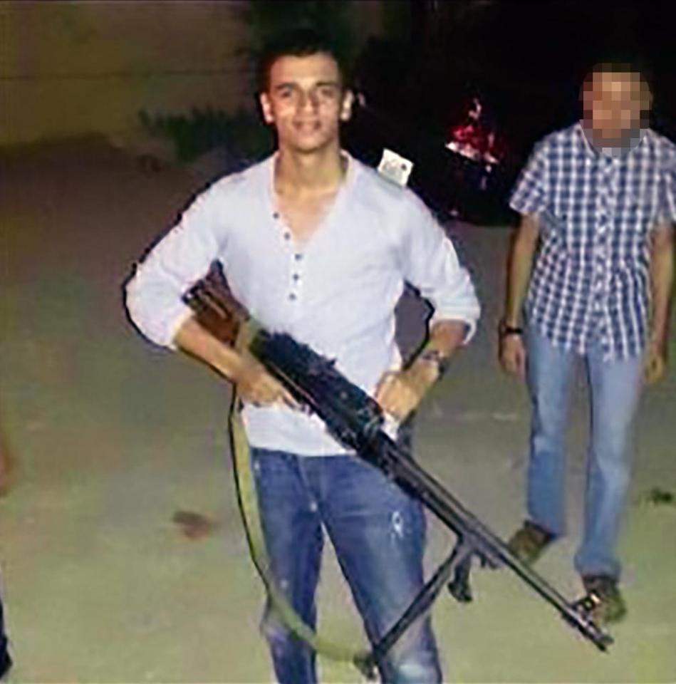 Ismail al-Abedi, the Manchester bomber's older brother, posing with a gun