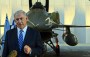Binyamin Netanyahu with a warplane in the background