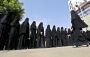 Saudi women in black shrouds