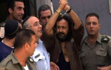 Marwan Barghouti in handcuffs