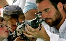 Jewish child colonist with gun